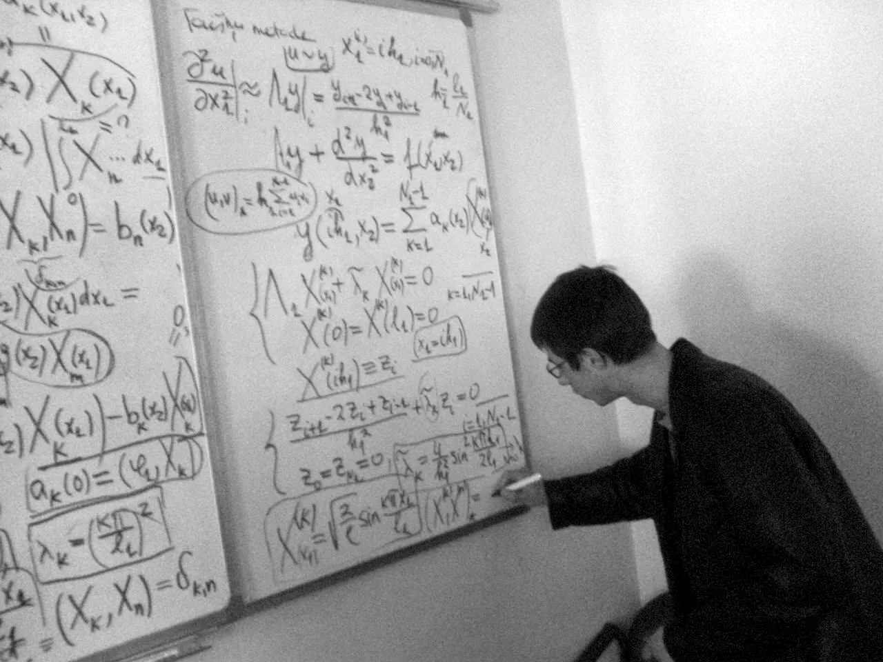 At the whiteboard: the Fourier method, University of Latvia.